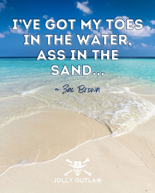 A serene beach with clear turquoise water and a quote from Zac Brown.