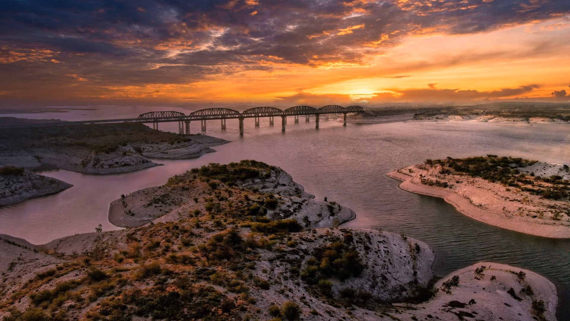 Sunset view over Lake Amistad with the Pecos River High Bridge in Texas.